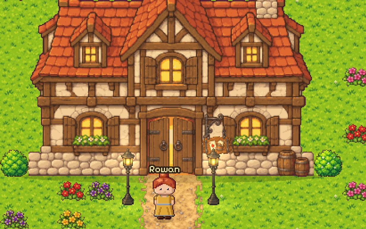 The capital in the game: the tavern with its red roof, flower beds, lamp posts and a player at the door.